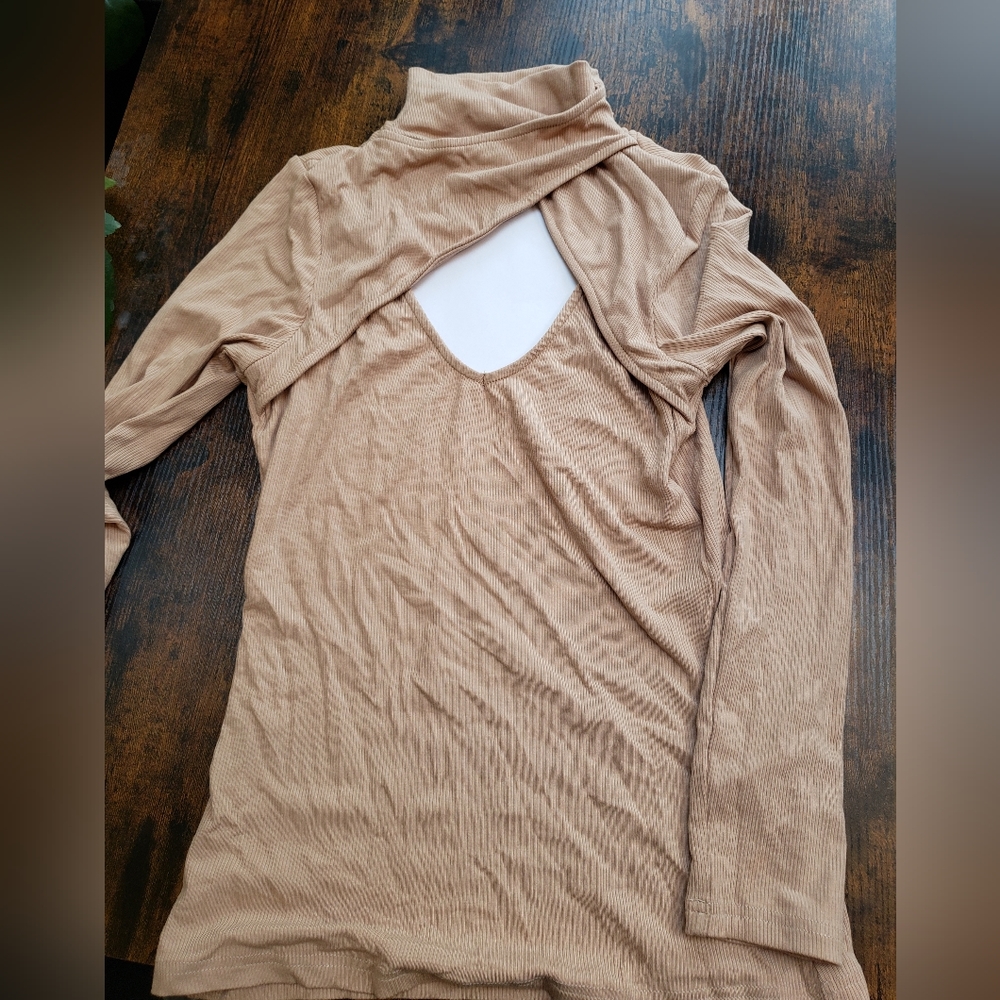 soft, stretchy, ribbed cutout peekaboo crossover turtleneck